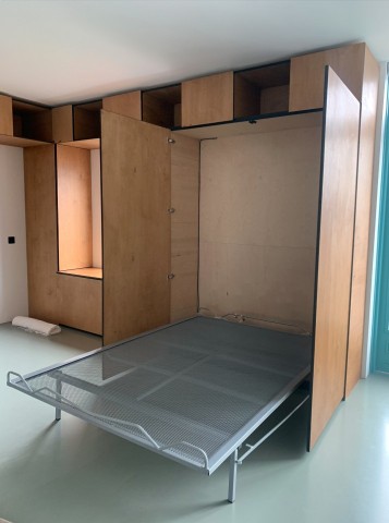 Wooden wall unit and bed