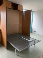 Wooden wall unit and bed